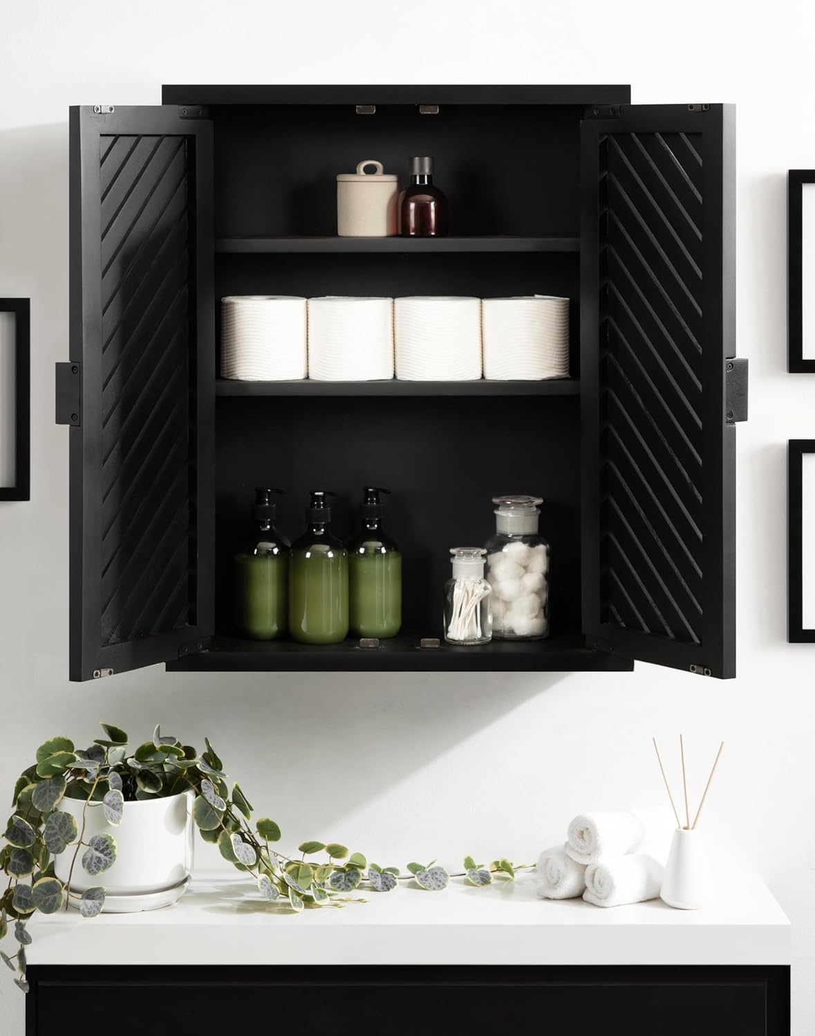 Kate and Laurel Mezzeta Decorative Modern Two-Door Floating Bathroom Cabinet; 22 x 7 x 28; Black; Decorative Over Toilet Storage Cabinet Made from Solid Mango Wood with Slatted Chevron Design