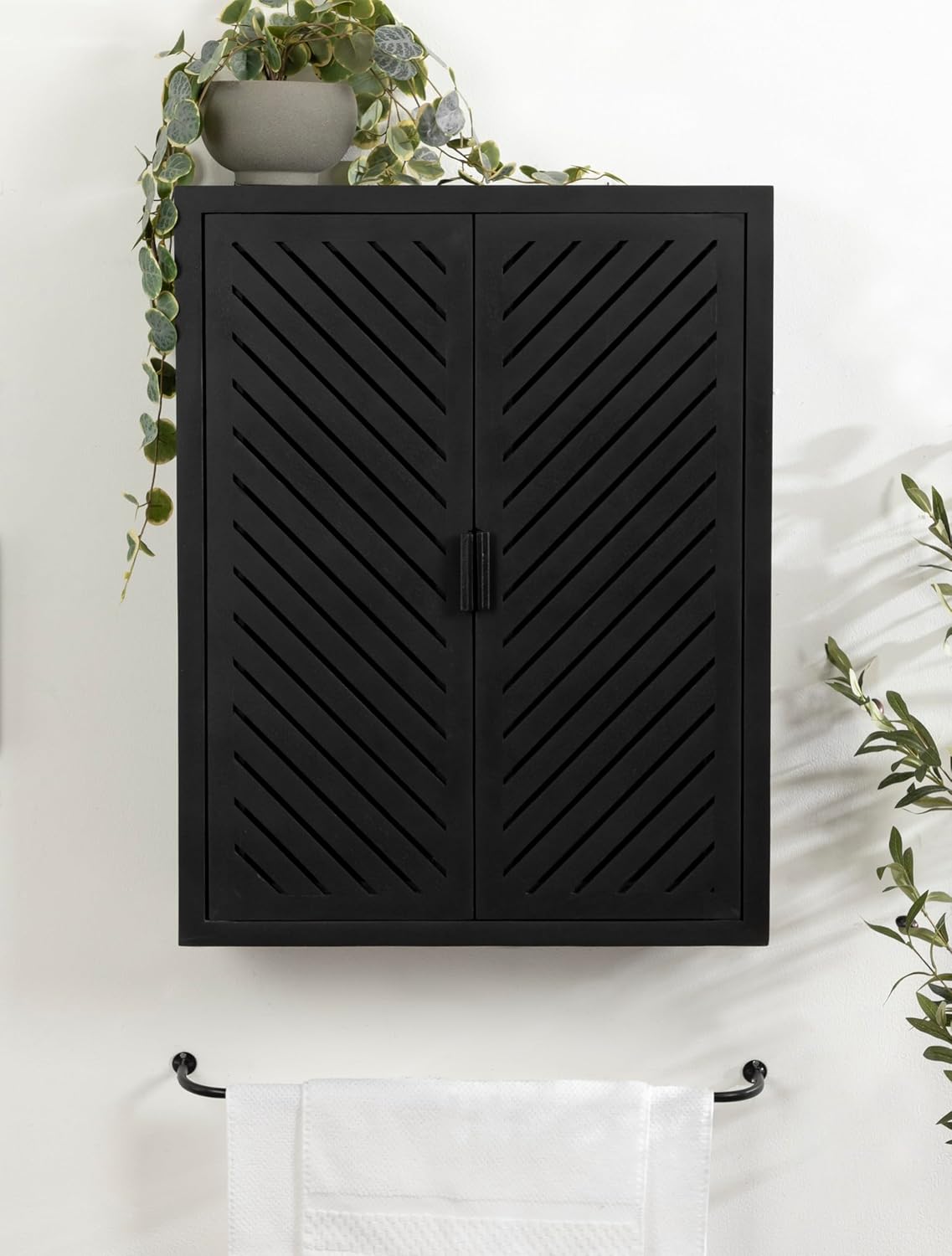 Kate and Laurel Mezzeta Decorative Modern Two-Door Floating Bathroom Cabinet; 22 x 7 x 28; Black; Decorative Over Toilet Storage Cabinet Made from Solid Mango Wood with Slatted Chevron Design