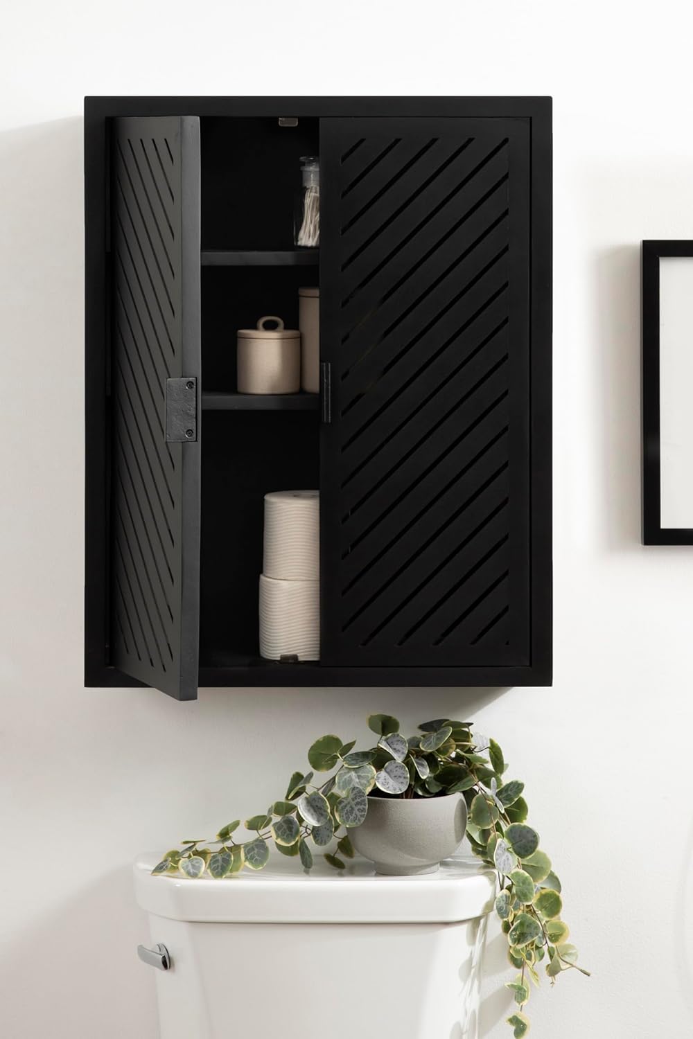 Kate and Laurel Mezzeta Decorative Modern Two-Door Floating Bathroom Cabinet; 22 x 7 x 28; Black; Decorative Over Toilet Storage Cabinet Made from Solid Mango Wood with Slatted Chevron Design